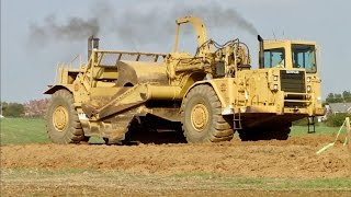 Large Caterpillar Earth Movers and Water Truck Working [upl. by Anitnuahs95]