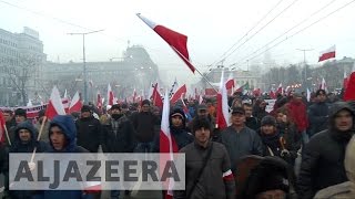 Poland Antiimmigration protests sweep through Warsaw [upl. by Elraet113]