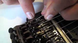 Restringing a guitar with a locking tremolo Floyd Rose [upl. by Vallie84]